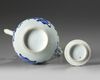 A Chinese blue and white ewer and a cover
