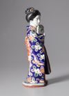 A JAPANESE KUTANI PORCELAIN FIGURE OF A GEISHA, SHOWA PERIOD, 1930's