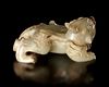A WHITE JADE CARVING OF PIXIE, CHINA, HAN DYNASTY (206 BC-220 AD)