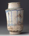A KASHAN POTTERY ALBARELLO, PERSIA 13TH CENTURY