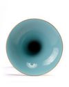 A Chinese ruby-ground famille rose 'bajixiang' gu vase