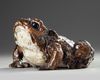 A Japanese ceramic figure of a frog