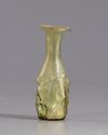 A ROMAN GLASS FLASK, CIRCA 3RD CENTURY AD