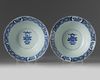 A pair of Chinese blue and white ‘floral’ klapmuts bowls