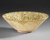 A NISHAPUR POTTERY BOWL, PERSIA 10TH/11TH CENTURY