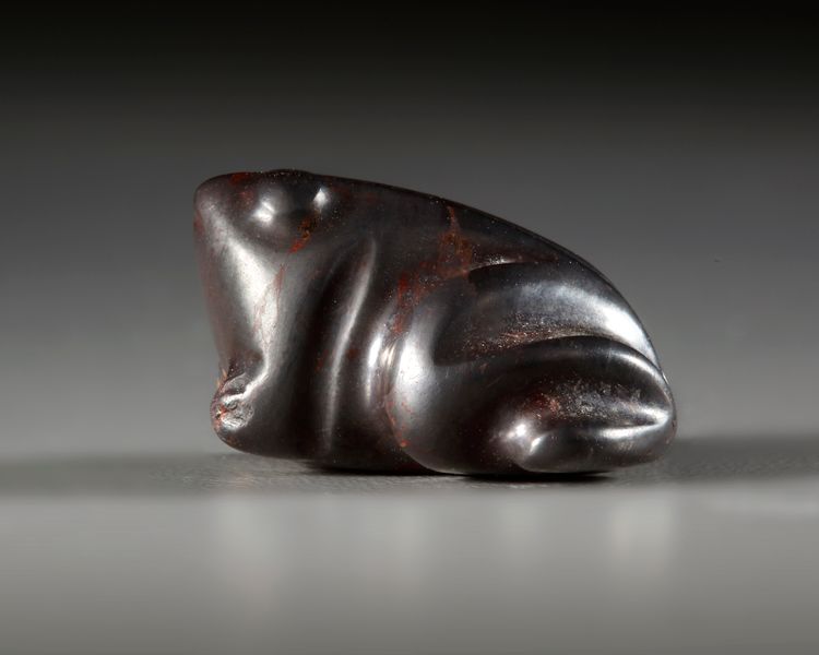 AN OLD BABYLONIAN HEMATITE FROG AMULET, CIRCA 19TH-16TH CENTURY B.C.
