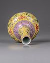 A yellow-ground famille rose bottle vase