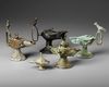 SIX PERSIAN BRONZE OIL LAMPS, SELJUK 12TH-13TH CENTURY AND LATER