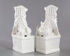 A PAIR OF CHINESE BLANC DE CHINE BUDDHIST LIONS