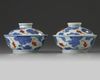A pair of Chinese iron-red and gilt decorated blue and white bowls and cover