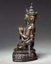 A Chinese cold-gilt bronze eight-armed Avalokitesvara