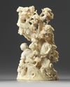 A Chinese carved ivory 'boys and pine' group