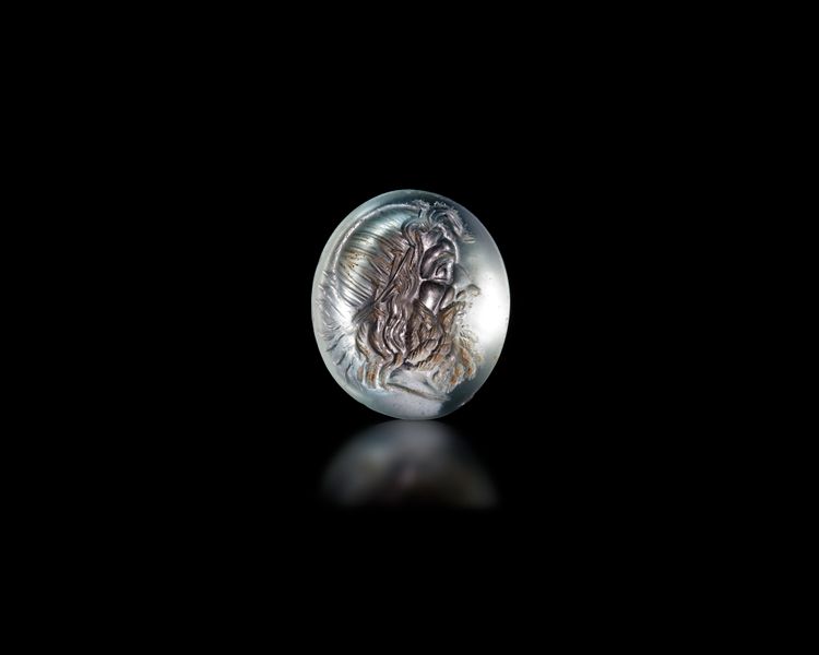 A ROMAN AQUAMARINE INTAGLIO OF POSEIDON, 1ST CENTURY BC-1ST CENTURY AD