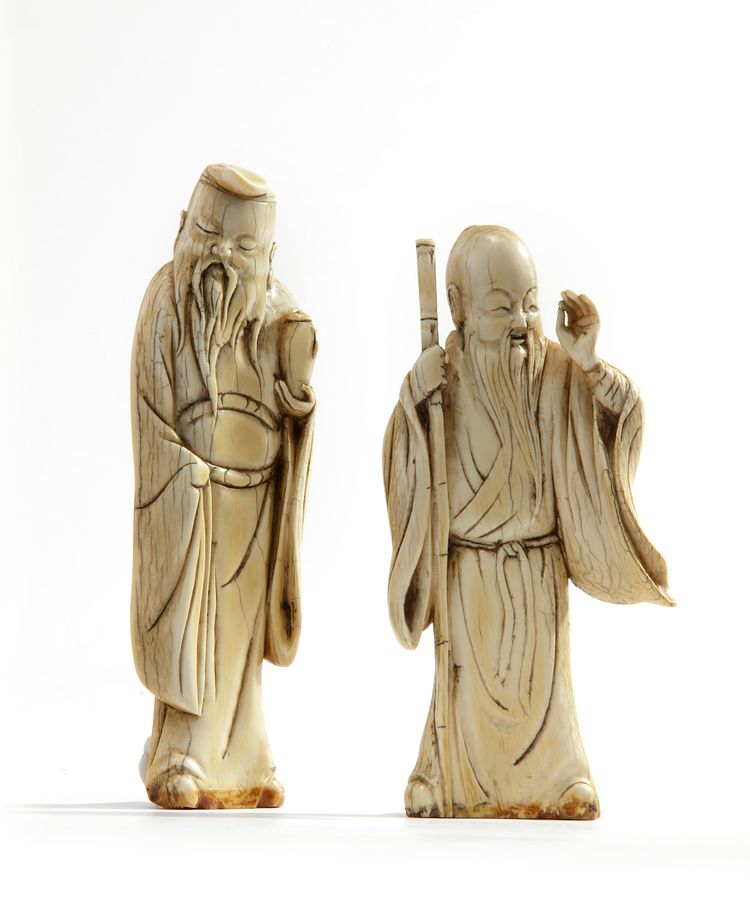 Two Chinese carved ivory figures