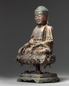 A Chinese gilt-lacquered bronze figure of Shakyamuni