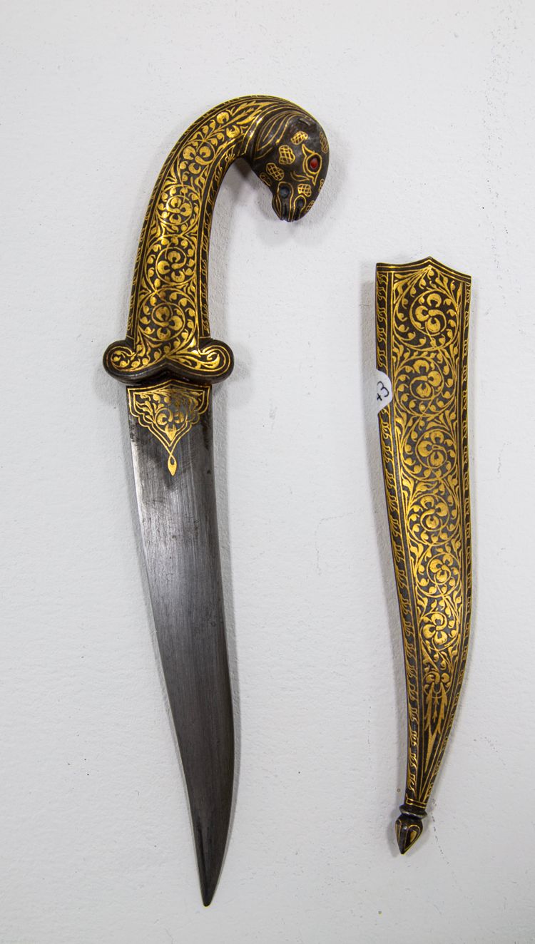 A GILT QAJAR RAM HILTED DAGGER, 20TH CENTURY