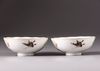 A pair of Chinese famille rose 'butterfly and flower' bowls
