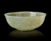A CHINESE CARVED JADE BOWL, 18TH CENTURY
