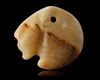 TWO WESTERN ASIATIC SEAL AMULETS IN THE FORM OF LION HEADS, CIRCA 3300-2900 B.C.