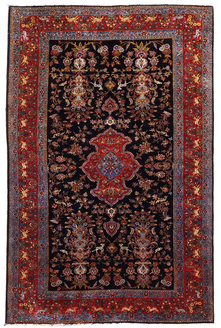 A FINE KASHAN SILK RUG, CIRCA 1900
