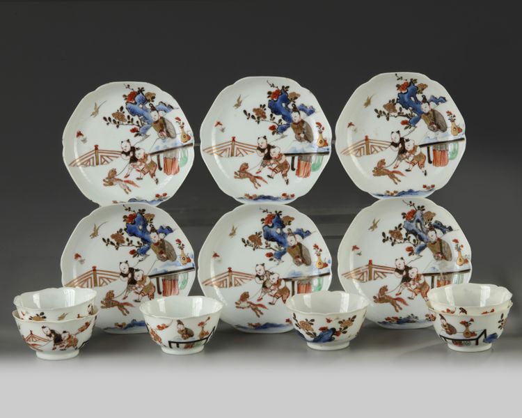 Six Chinese gilt and enamelled foliate cups and saucers
