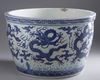 A massive Chinese blue and white 'nine dragons' jardiniere