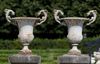 AN UNUSUAL PAIR OF FRENCH CAST IRON VASES WITH WINGED DRAGON HANDLES, THIRD QUARTER 19TH CENTURY