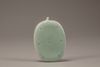 A celadon-glazed 'melon'-shaped inkstone
