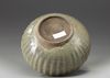 A celadon-crackle-glazed moulded jar