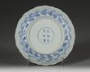 A Chinese blue and white 'Eight Daoist Emblems' barbed rim dish