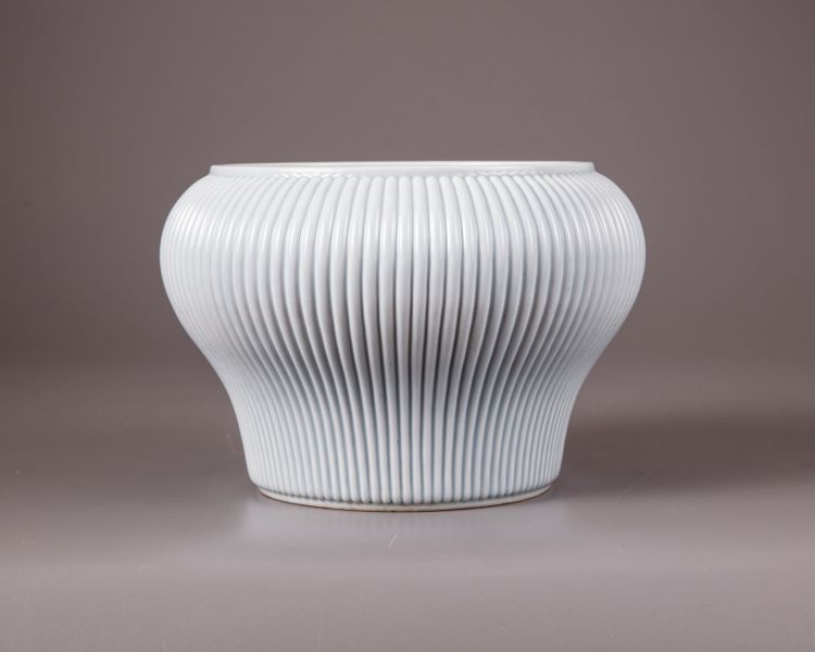 A Chinese claire-de-lune-glazed 'hundred-rib' jar