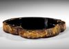 A JAPANESE IRREGULAR SHAPED BLACK LACQUERED WOODEN TRAY,  MEIJI PERIOD (1868-1912)