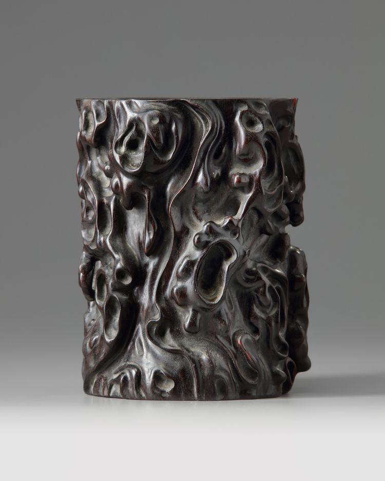 A Chinese ebony 'tree trunk' brush pot, bitong