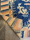 A CHINESE DRAGON RUG, EARLY 20TH CENTURY