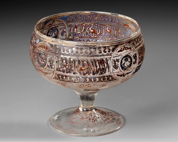 AN ISLAMIC GILDED AND ENAMELED FOOTED BOWL, 19TH-20TH CENTURY