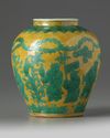 A Chinese yellow ground and green glazed 'boys' jar