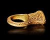 A MAGNIFICENT EARLY ISLAMIC GOLD RING,  NEAR EAST 10TH-11TH CENTURY