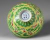 A Chinese yellow and green-enamelled 'bat' bowl with polychrome details