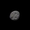 AN EARLY ISLAMIC GLASS WEIGHT OF QUARTER DINAR