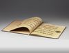 A LEATHER-BOUND BOOK WITH ISLAMIC TRANSCRIPTS