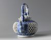 A Chinese blue and white double wall reticulated teapot