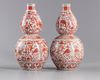 A PAIR OF  CHINESE IRON-RED DOUBLE GOURD VASES, 19TH-20TH CENTURY