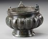 A BYZANTINE BRONZE INCENSE BURNER WITH GREEK DEDICATION, CIRCA 650-800 A.D