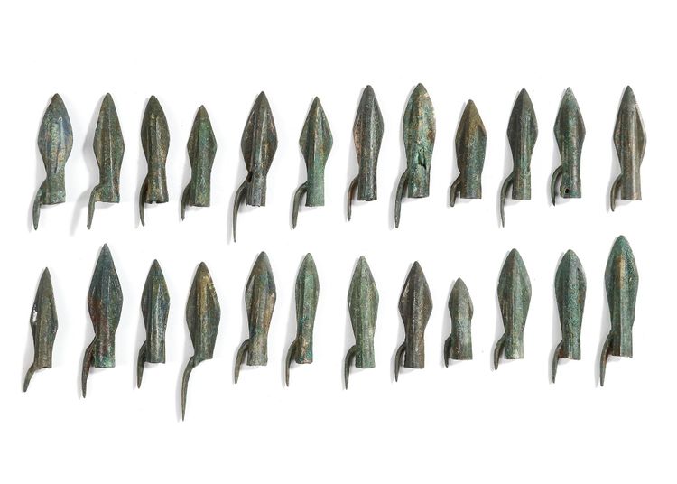 A GROUP OF GREEK BRONZE ARROWHEADS, CIRCA 8TH-6TH CENTURY B.C.