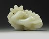 A large Chinese white jade ‘squirrel and grapes’ carving