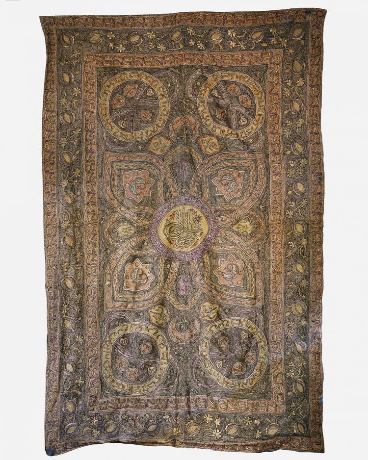 An Islamic embroiderered  prayer panel