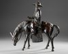 A CHINESE BRONZE FIGURE OF A SCHOLAR RIDING A DONKEY,19TH CENTURY