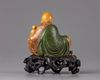 A Chinese soapstone figure of a Luohan