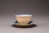 A cafe au lait cup and saucer