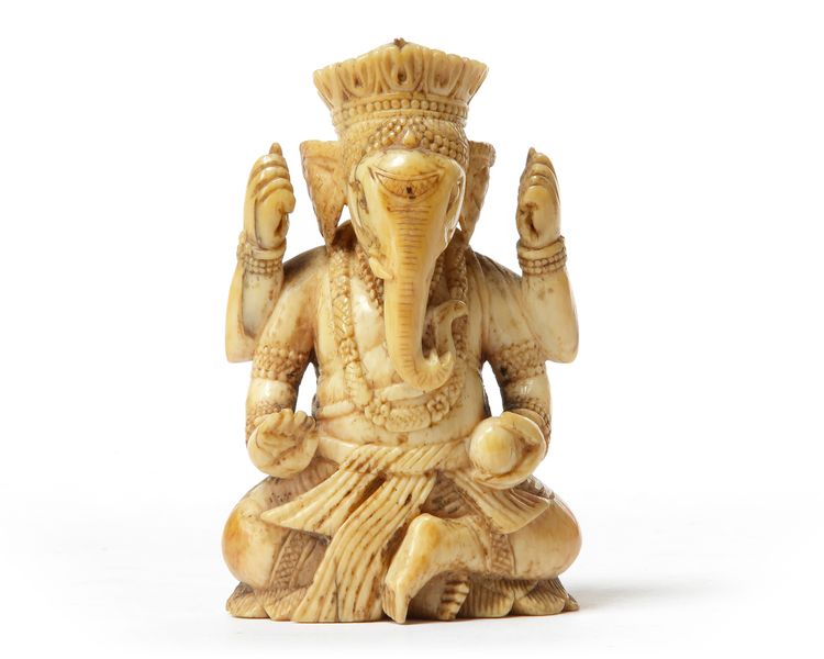 AN INDIAN SEATED GANESHA, 17TH CENTURY